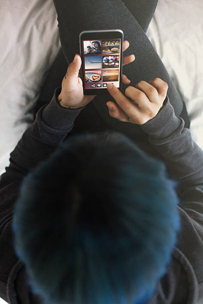 istock Young woman using smartphone at home 507754822