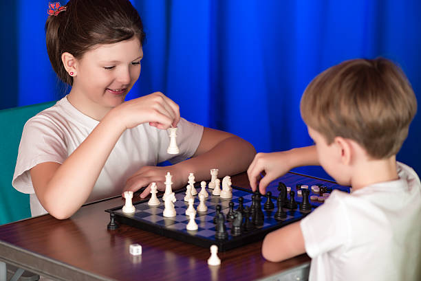 istock Children play a board game called chess. 507754982