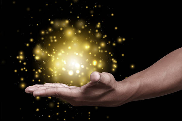 istock Abstract Golden glitter with hand 507757178