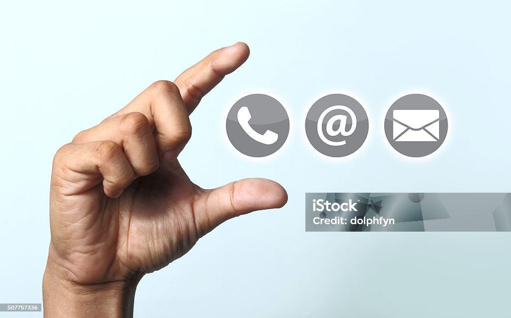 Contact us icon Grey color contact us icons on card with hand Communication Stock Photo