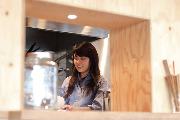 istock Young woman works in the kitchen 507757878