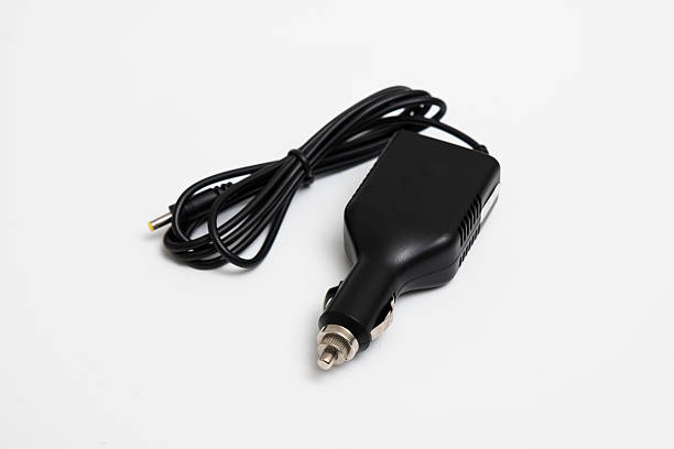 istock AC Adapter Car Charger Isolated on White 507759394