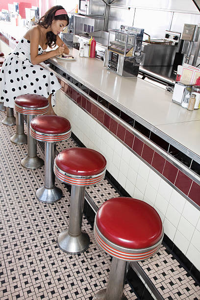 istock Woman At Diner Counter 507769903