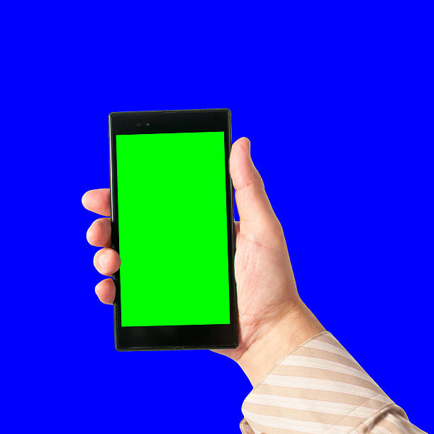 istock Man holds in hand touchscreen tablet with chroma key 507773061