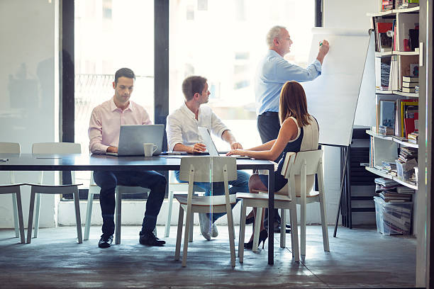 istock Businesspeople having meeting in office. 507774337