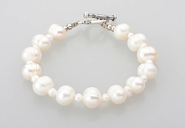 istock Beautiful pearl bracelet isolated 507775169