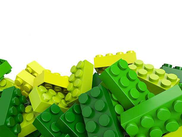 istock toy plastic bricks background in green and yellow 507787812