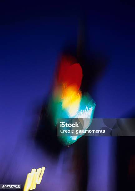 Blurred Traffic Light Stock Photo - Download Image Now - Amber Light, Night, Alertness