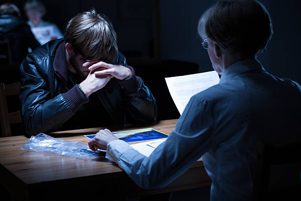 istock Worried male suspect during hearing 507789996