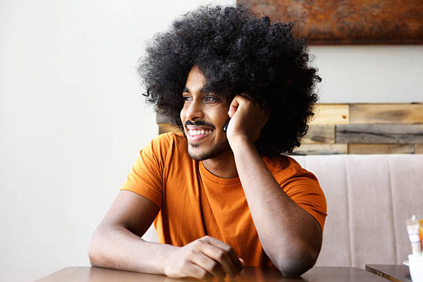 istock Young man listening to cellphone 507791180