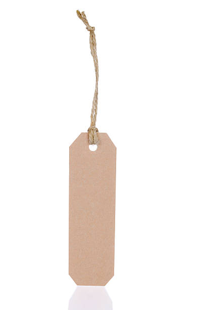 istock cardboard tag with ribbon isolated on white background 507791331
