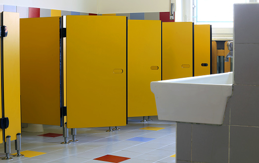 nursery bathrooms with yellow doors of cabins and sink