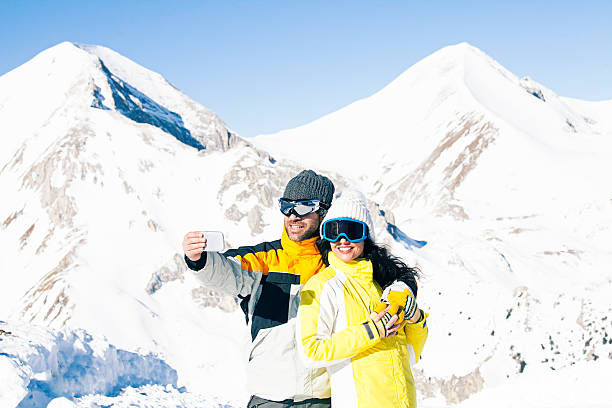 istock Young couple taking selfie 507793332