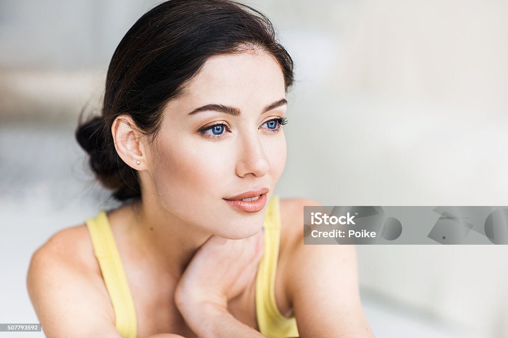 Close-up portrait of beautiful woman Young woman portrait Black Hair Stock Photo