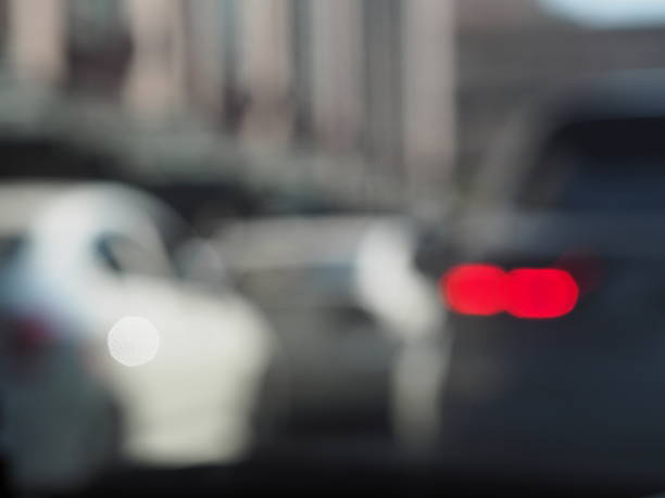 istock Bokeh vehicle on the road background 507794296