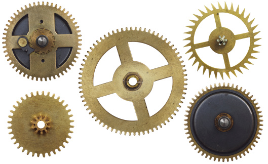 Clock gear wheels isolated on white background.