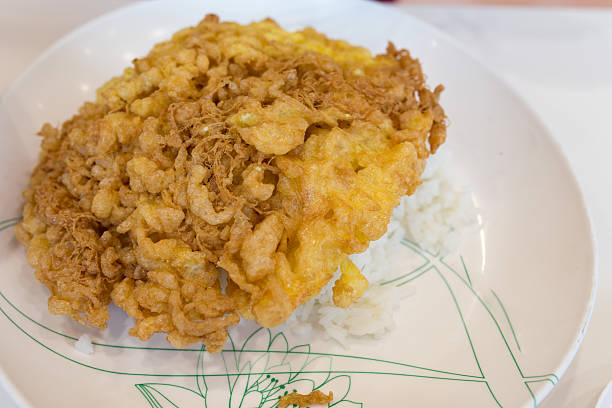 istock rice and omelet it's popular traditional Thai style food 507795576