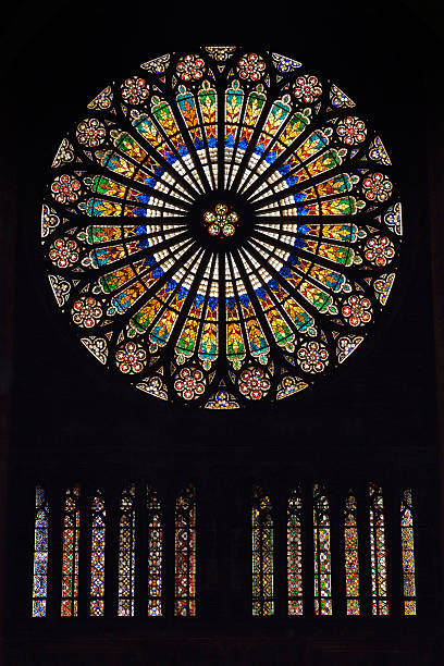 Strasbourg cathedral (France) Big stained glass in Strasbourg cathedral (France). notre dame de strasbourg stock pictures, royalty-free photos & images