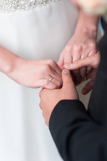 istock Bride and groom holds hands 507799214