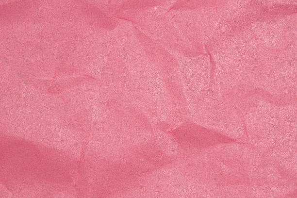 istock Crumpled pink paper sheet texture 507799296