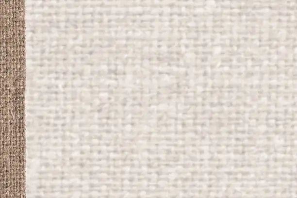 Textile tissue, fabric industry, beige canvas, jutesack material house background