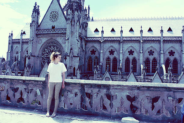 girl and basilica in quito on backgruond