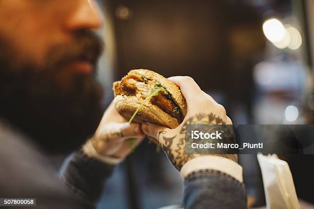 Hipster Businessman During Lunchtime Stock Photo - Download Image Now - Burger, Men, Eating