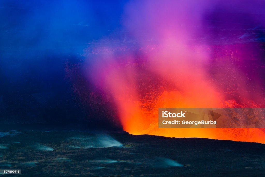 Erupting volcano Closeup shot of volcanic eruption at night with small steaming vents on Big Island, Hawaii Erupting Stock Photo