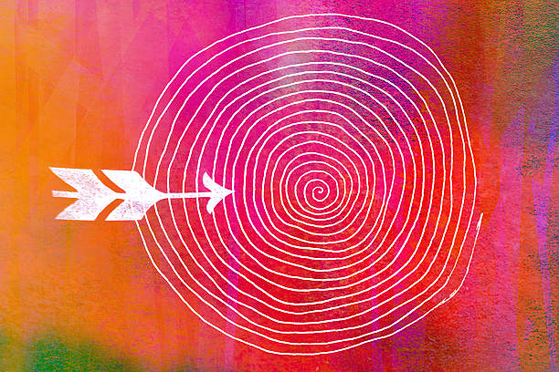 flecha y objetivo fabricados a mano sobre fondo de textura de impresión - circle swirl target aspirations fotografías e imágenes de stock