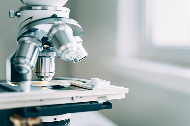 Microscope in Laboratory Microscope in the Laboratory, modern close-up shot medical instrument stock pictures, royalty-free photos & images