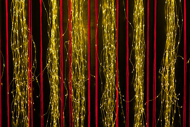 istock abstract of hanging fairy lights 507804462