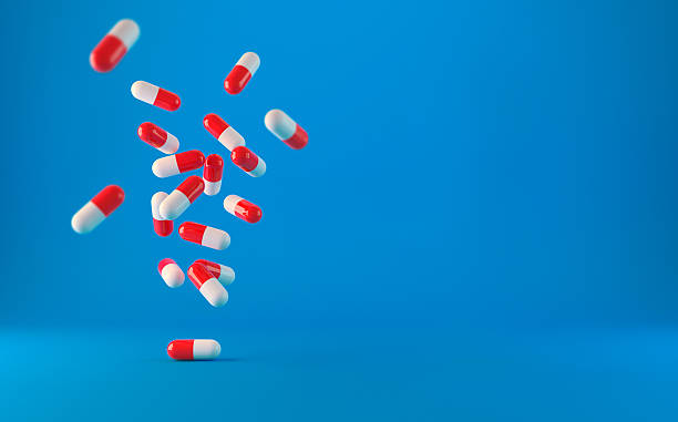 Medical pills drugs falling down Medical pills drugs falling down. 3d rendered   illustration pharma herbal medicine pill medicine stock pictures, royalty-free photos & images