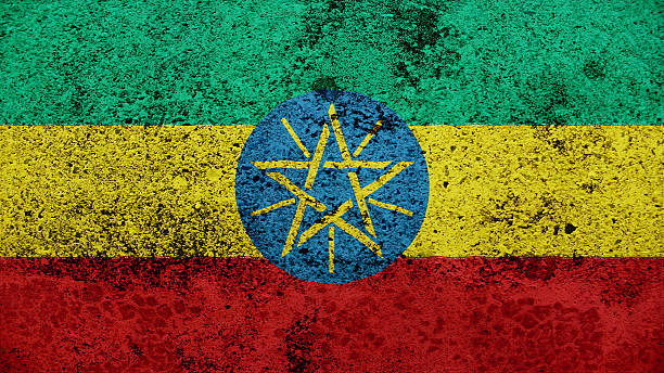 istock ethiopia Flag on the old wall texture 507818119