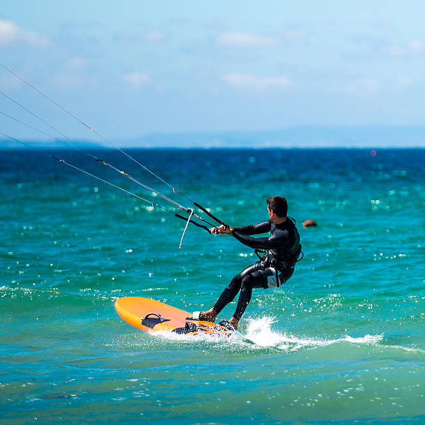 istock Kite Surfer in sea waves 507819691