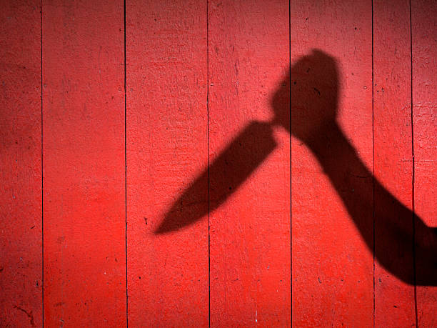 istock Male Hand Shadow with Kitchen Knife 507820065