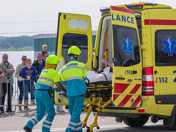 Dutch medical services in action Almere, Netherlands - April 12, 2014: Medical services at work in an enacted emergency scene during the first National Security Day held in the city of Almere to grow awareness among people flevoland photos stock pictures, royalty-free photos & images