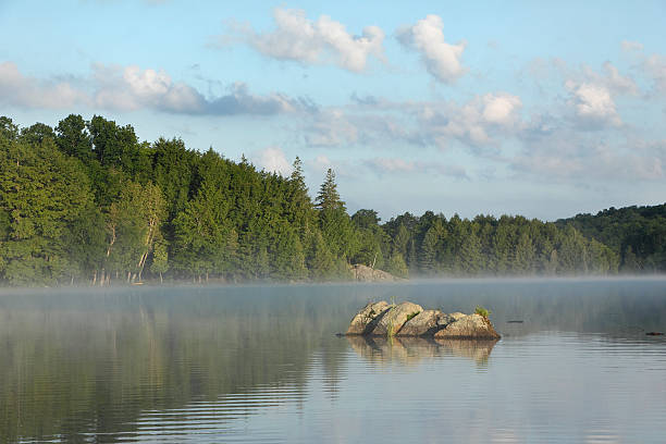 istock Rocks on Misty Lake 507821741
