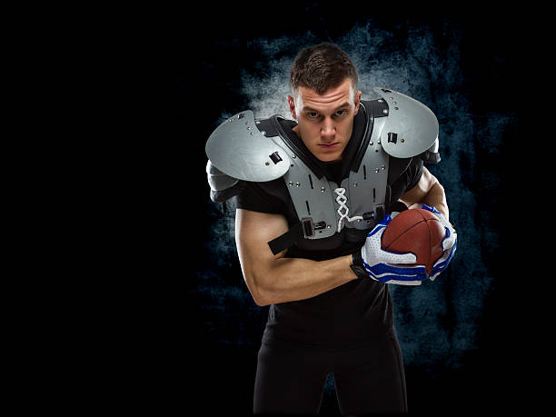 istock American football player posing 507822265