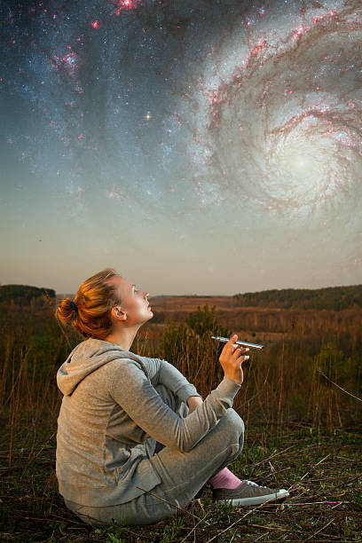 istock girl and a starry sky. 507823145