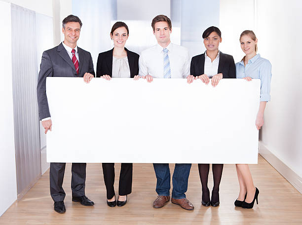 istock Businesspeople Holding Blank Placard 507823409