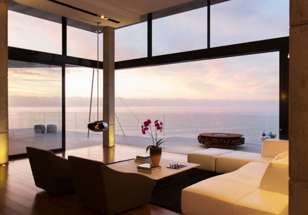 istock Modern living room overlooking ocean 507831433