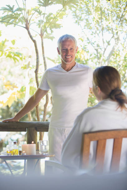 istock Couple relaxing together on balcony 507831465