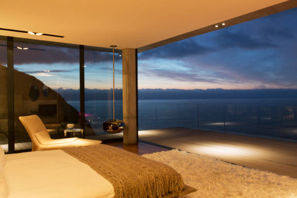 istock Modern bedroom overlooking ocean 507831627
