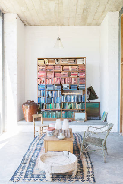 istock Bookshelves and coffee table in rustic house 507831951