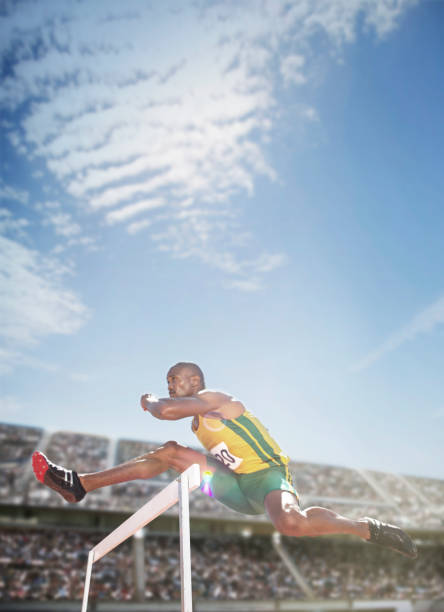 istock Track and field athlete jumping hurdle 507832047