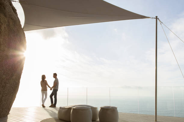istock Couple standing on modern balcony 507832097