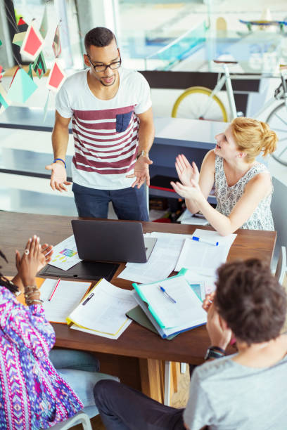 istock People applauding colleague in office 507832571
