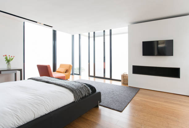 istock Bed and sliding glass doors in modern bedroom 507832637