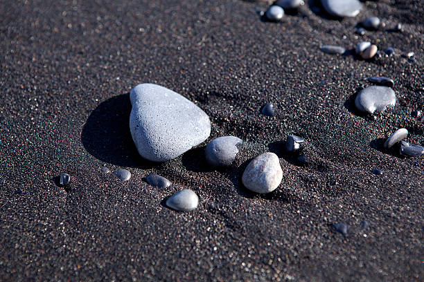 istock Stones at a black sand beach 507832772