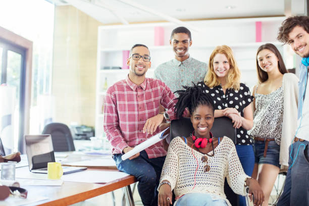 istock People smiling together in office 507833003
